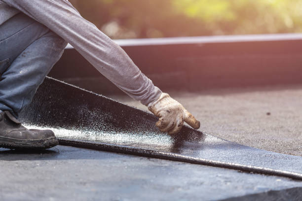 Professional Exterior Waterproofing technician working in Hamburg, NY